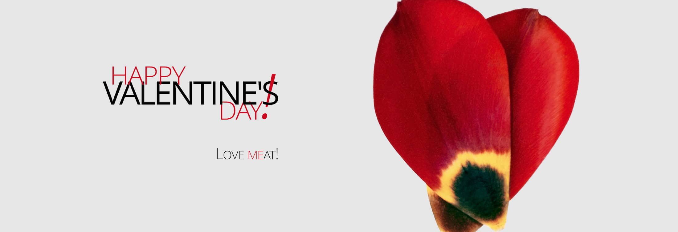 Image of two flower petals placed in a heart shape. Text reads 'Happy Valentine's Day! Love MEat!'